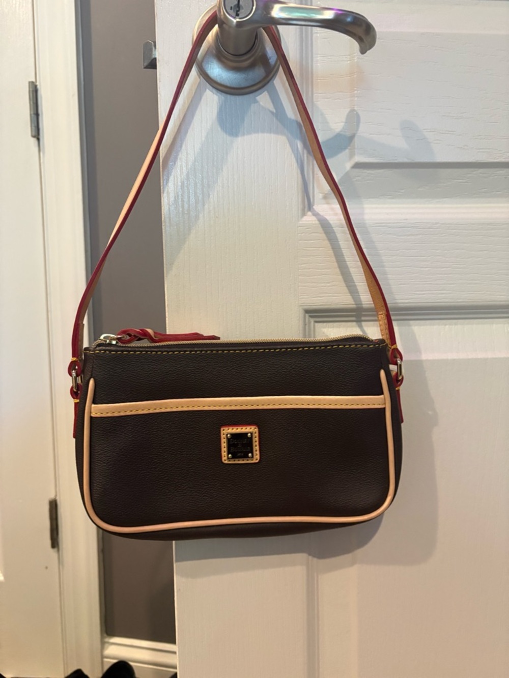 Dooney & Bourke Brown Pebble Leather bag with tan trim